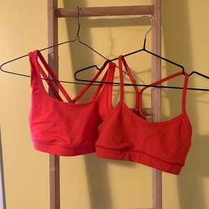 Pink and red lulu sports bras